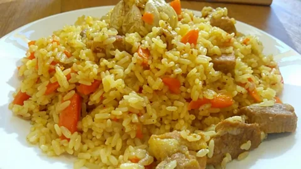 плов из свинины 100г