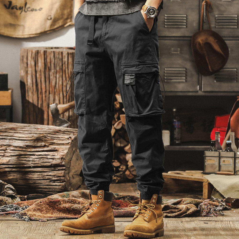 Брюки для мужчин свободные с накладными карманами и резинками внизу брючины от бренда JIELEINUO