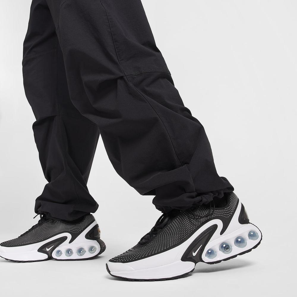 HM7158-010 Брюки M NK TCH WVN PANT OS