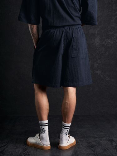 Синий хлопковый костюм в рубчик