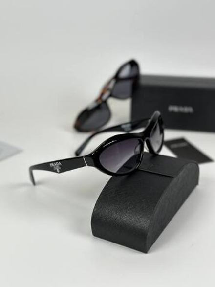 Очки Prada