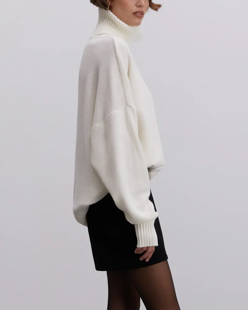 Свитер из шерсти с высоким воротником молочный