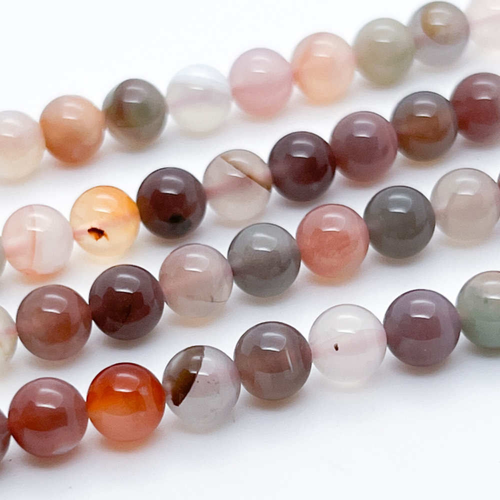 Агат + халцедон, диаметр около 6,2-6,3 мм, цена за 31-32 шт (1/2 нити)