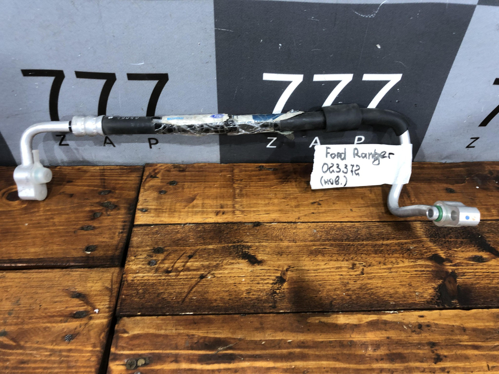 Трубка кондиционера Ranger, B-series 97-06 Новая Оригинал UH7161461A