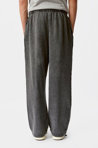 Серые спортивные брюки с эффектом варки