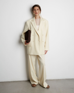 Жакет с дополнительными петлями из шерсти молочный