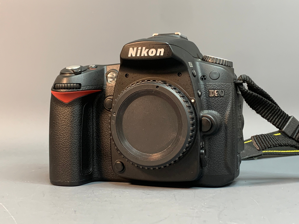 Nikon D90 9.000 кадров