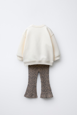 ZARA КОМПЛЕКТ: ТОЛСТОВКА И РАСКЛЕШЕННЫЕ ЛЕГИНСЫ С ПРИНТОМ, СЛОНОВАЯ КОСТЬ