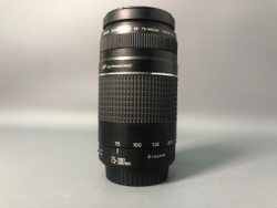 Canon 75-300mm III USM, царапины на верхней линзе.