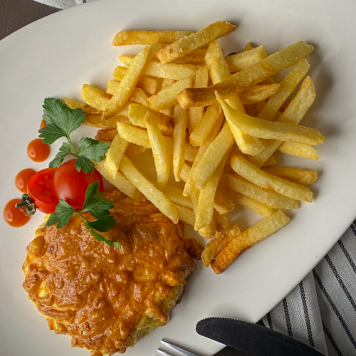 Мясо, запечённое с грибами под сыром