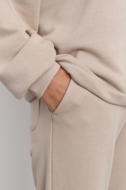 Свободные джоггеры без начеса из премиум футера серо-бежевого цвета