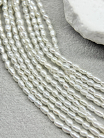 Натуральный барочный жемчуг супермелкий 1,5-2 мм, кремовый, нить 18 см