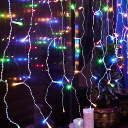 ULD-C3020-240-STK MULTI IP44 Занавес светодиодный со статическим свечением. 3х2м. Соединяемый. 240 светодиодов. Разноцветный свет. Провод прозрачный. TM Uniel