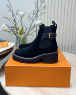 Женские ботинки Louis Vuitton Beaubourg замшевые черного цвета