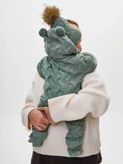 Вязаный комбинезон для новорожденных с мехом