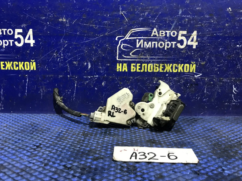 Замок двери задней левой NISSAN CEFIRO 1994