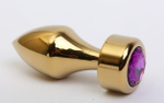 Золотистая анальная пробка с широким основанием и фиолетовым кристаллом - 7,8 см. (Цвет: фиолетовый)