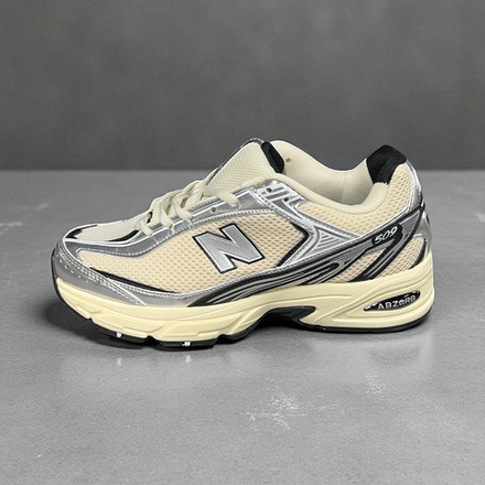 New Balance 509 • Silver Gold