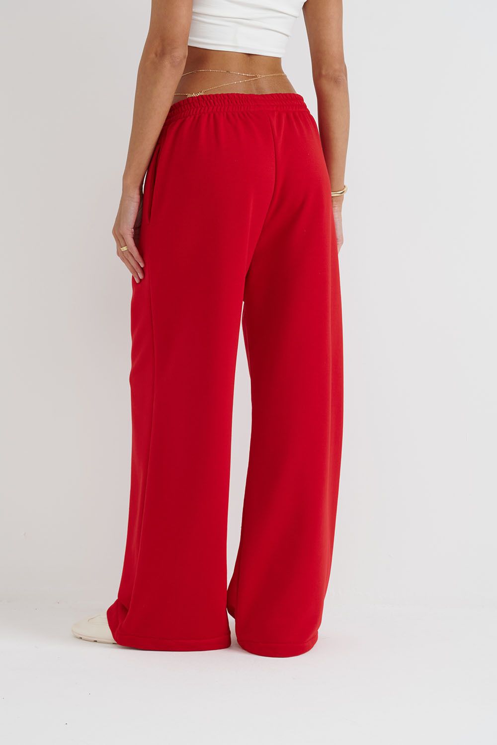 Широкие джоггеры без начеса с утяжкой красного цвета