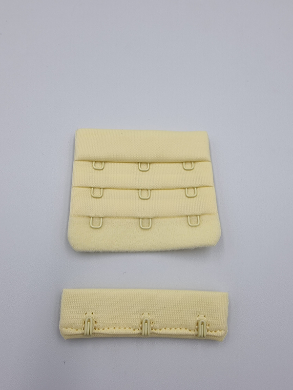 Застёжка тканевая на 3 крючка светло-желтая 57 мм (Pantone 11-0616 TPG)