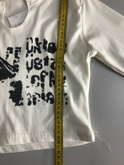 Футболка в рубчик стильная, маркировка S, визуально на 44 размер