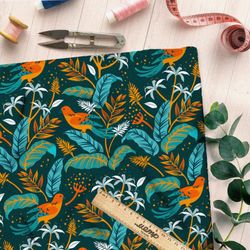 Ткань флис синие листья с оранжевыми птицами