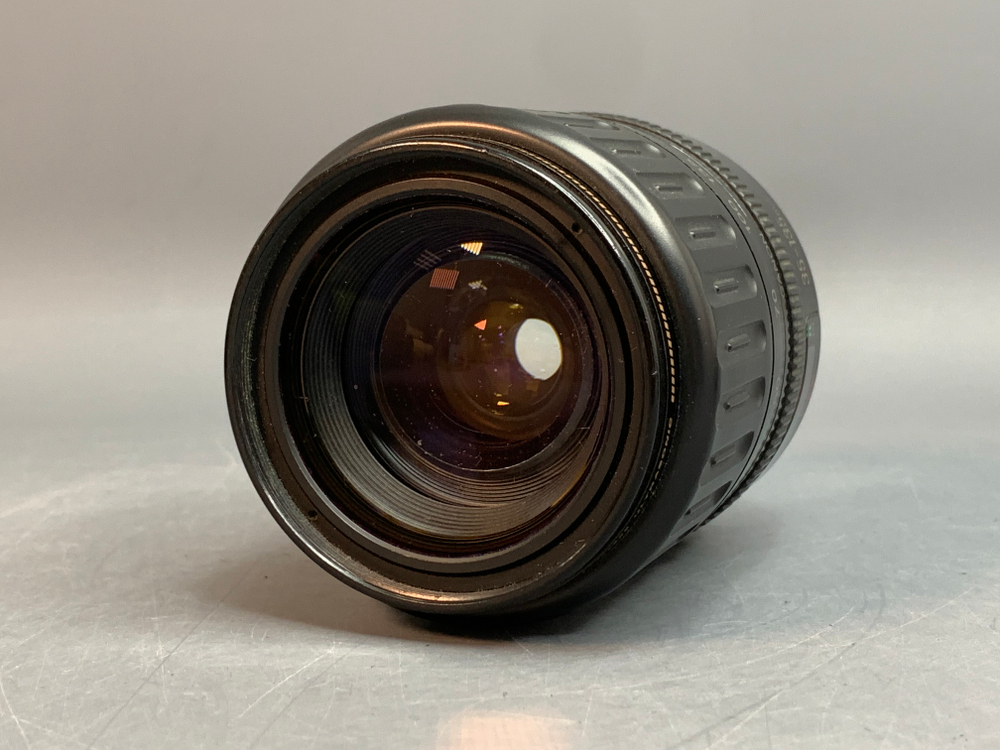 Canon EF 28-135mm 3.5-5.6 IS плохо работает кольцо зума, микроцарапины, внутри пыль