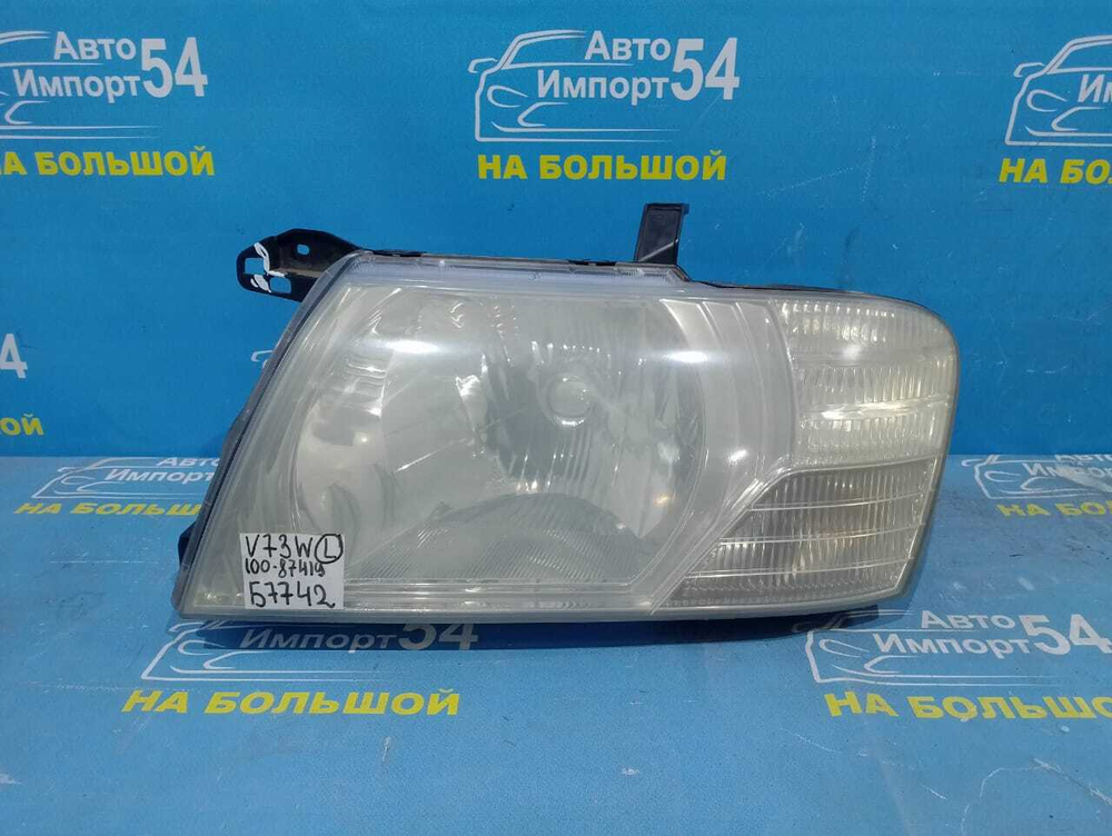 Фара передняя левая MITSUBISHI PAJERO 2002-2006