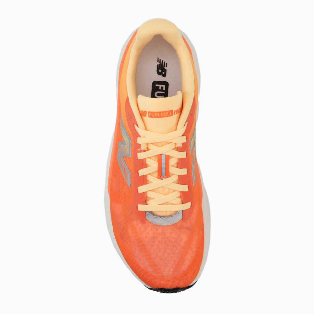 Женские Кроссовки для бега New Balance FuelCell Rebel V5 tangerine heat/silver metallic