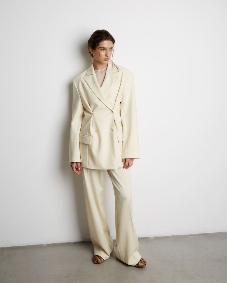 Брюки из шерсти молочный