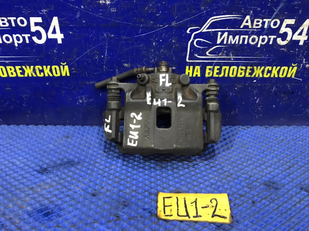 Суппорт тормозной передний левый Honda CIVIC 2001