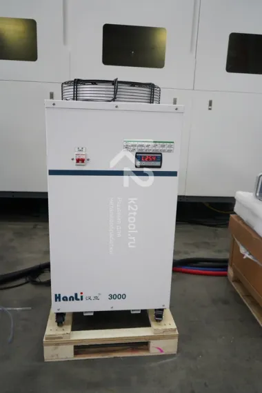 Лазерный станок HGTECH SMART3015PRO 12 кВт с защитной кабиной и сменным столом для резки листов металла