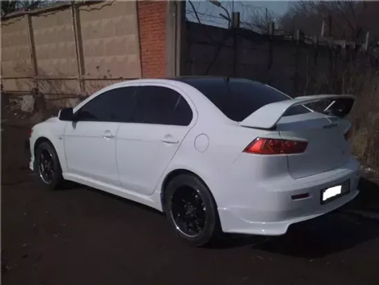 Юбка заднего бампера var.1 Zodiak для Mitsubishi Lancer 10