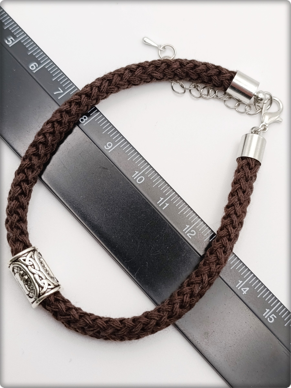 Браслет "Руна Феху" (20см) коричневый текстиль.