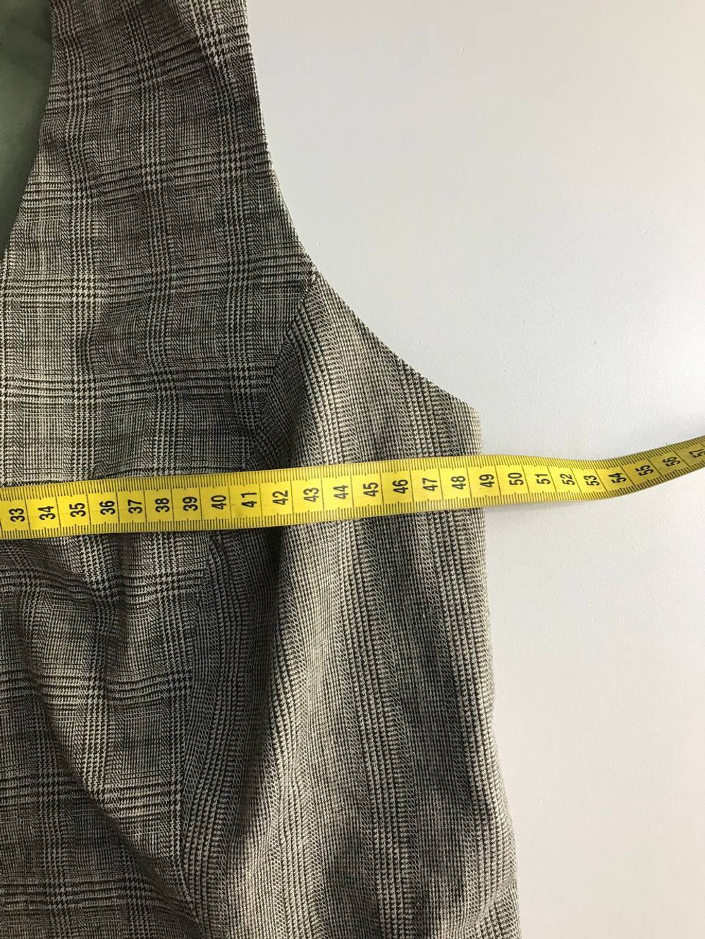 Жилетка для модного акцента в образе, визуально на 46 размер