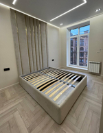 Двуспальная кровать с мягким изголовьем