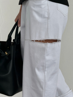 Джинсы с разрезами