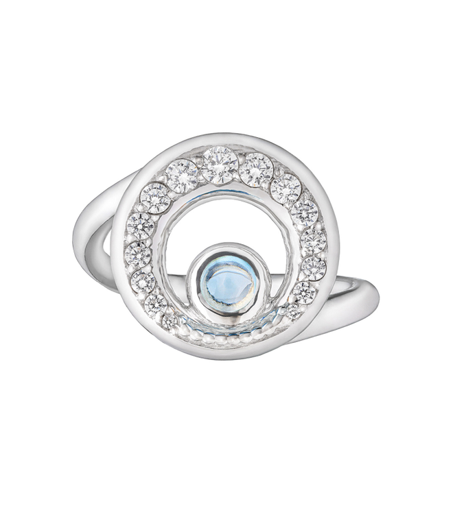 Кольцо из серебра со вставками из топаза и бесцветных фианитов