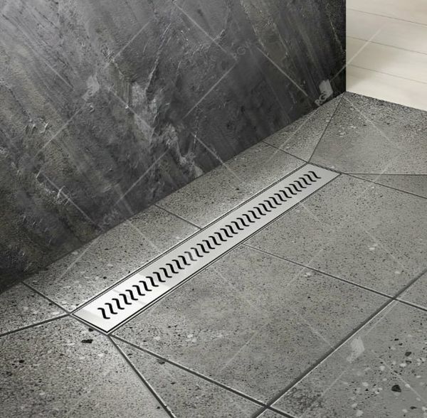 Душевая в пол: как выбрать надежный трап и не затопить соседей?