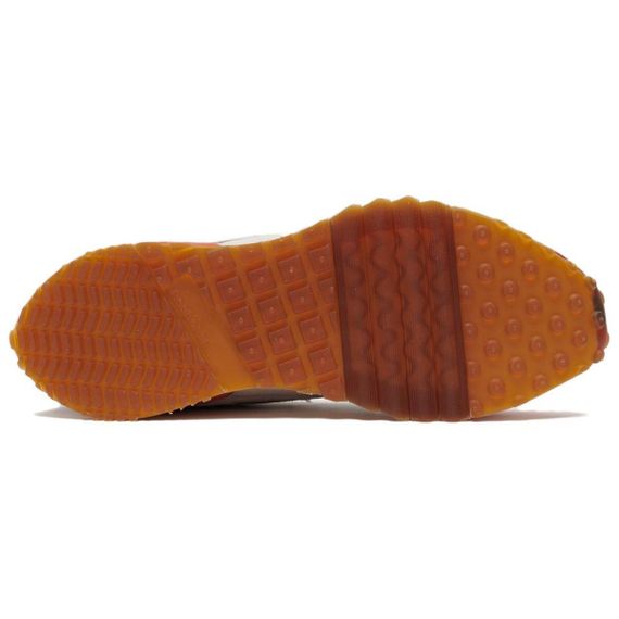 Кроссовки Reebok LX2200 - это универсальный топ красного цвета.