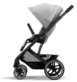 Коляска 3 в 1 Cybex Balios S Lux BLK и автокресло Aton B2 i-Size Volcano Black с базой isofix Base One Lava Grey с дождевиком