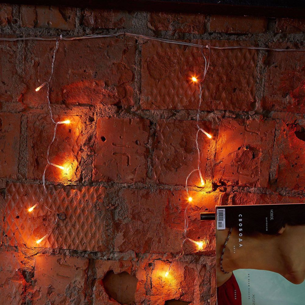 ULD-B12006-195-TTK AMBER IP44 Бахрома светодиодная с эффектом мерцания. 12м. Соединяемая. 195 светодиодов. Янтарный свет. Провод прозрачный. ТМ Uniel