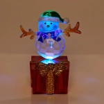 Фигурка с подсветкой «Снеговичок в колпачке на подарке» 9 см