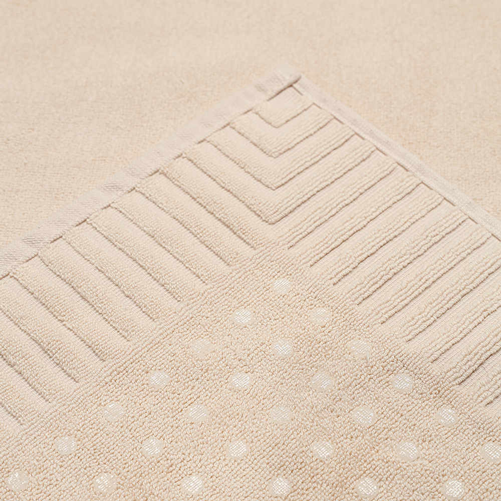 Коврик для ванной с фактурным бортиком кремового цвета из коллекции essential, 50x80 см