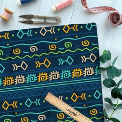 Ткань барби разноцветные символы и руны на тёмно-синем фоне