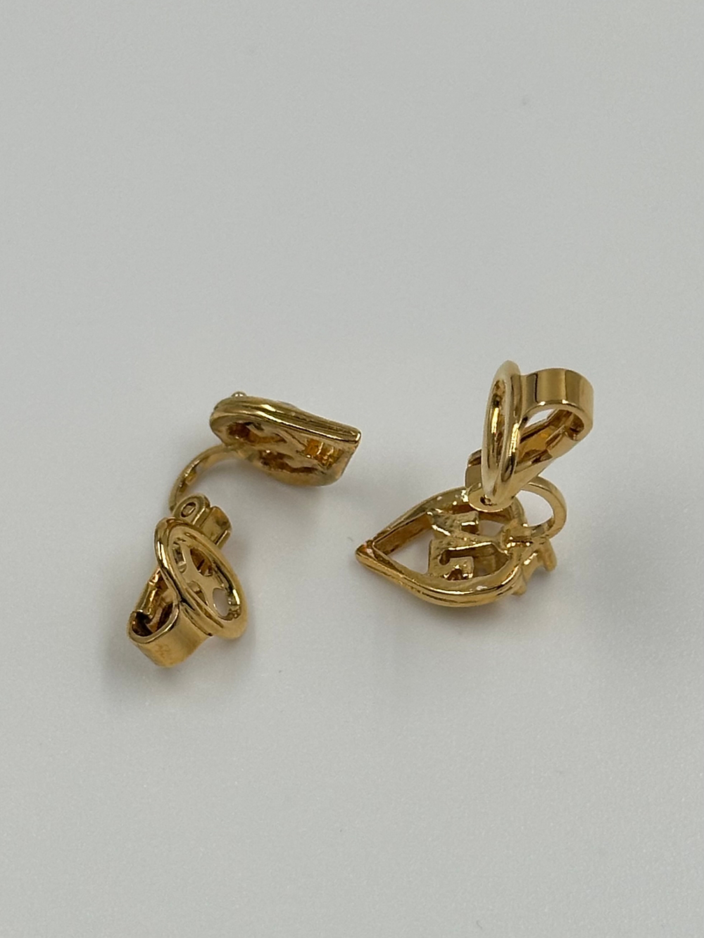 Миниатюрные клипсы Nina Ricci