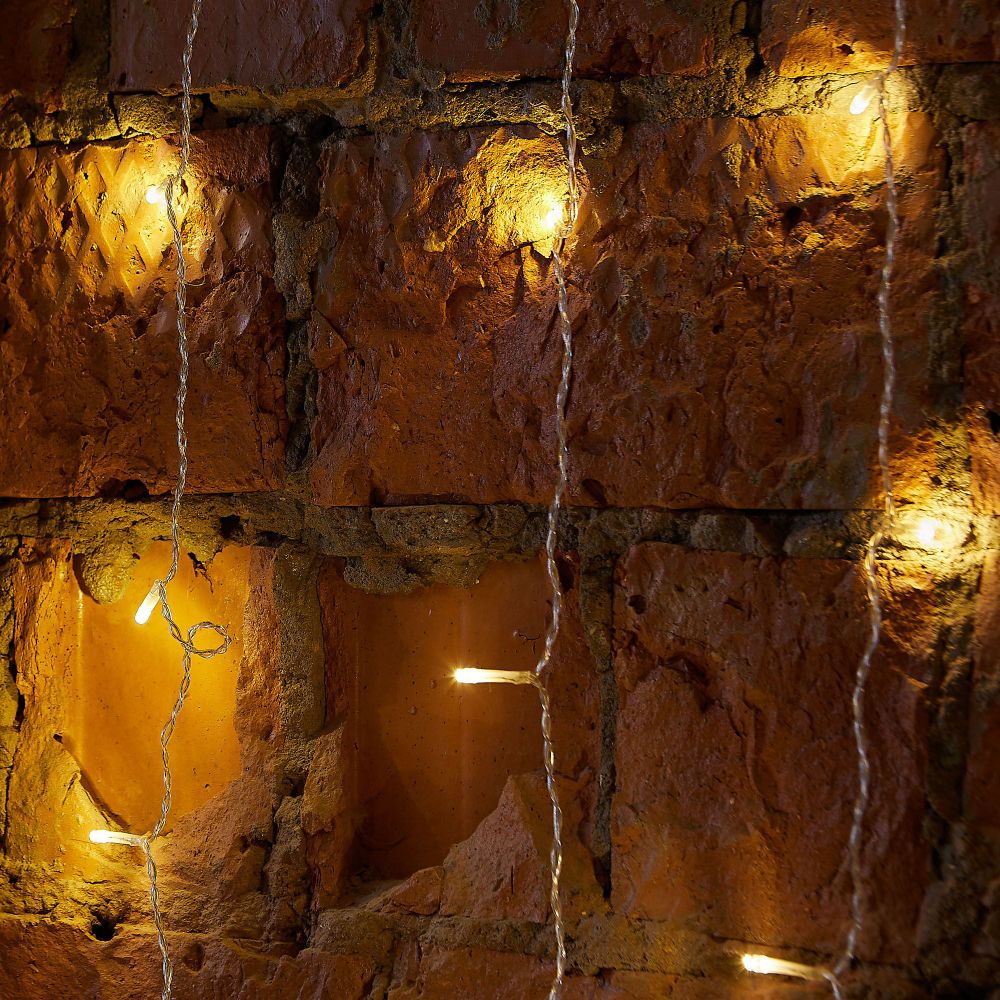 ULD-C3020-264-TTK WARM WHITE IP44 Занавес светодиодный с эффектом мерцания. 3х2м. 264 светодиода. Теплый белый свет. Провод прозрачный. TM Uniel