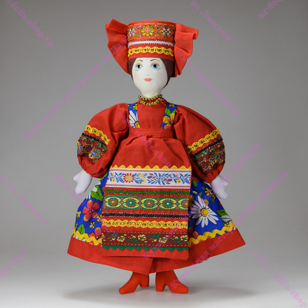 Текстильная кукла в цветастом сарафане