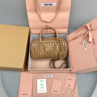Miu Miu Matelasse Nappa Leather Top Handle Bag 24 cm