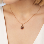 Подвеска «Божья коровка» из красного золота с гранатами